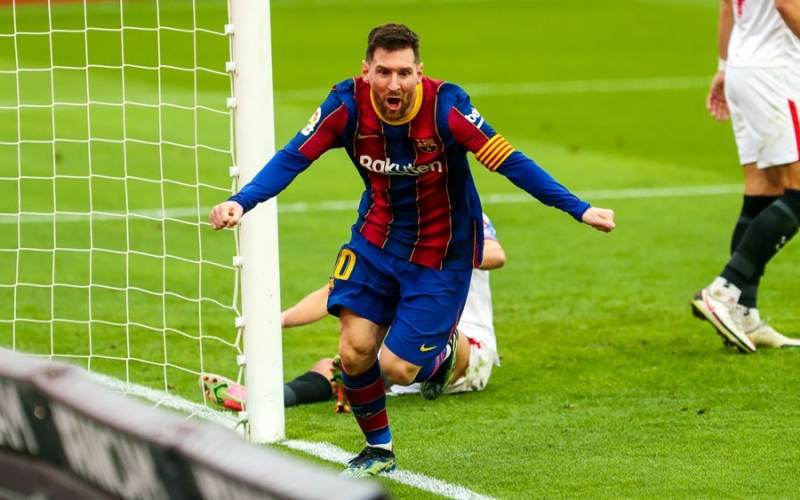 Thiên tài Lionel Messi giúp Barcelona hạ gục Sevilla.